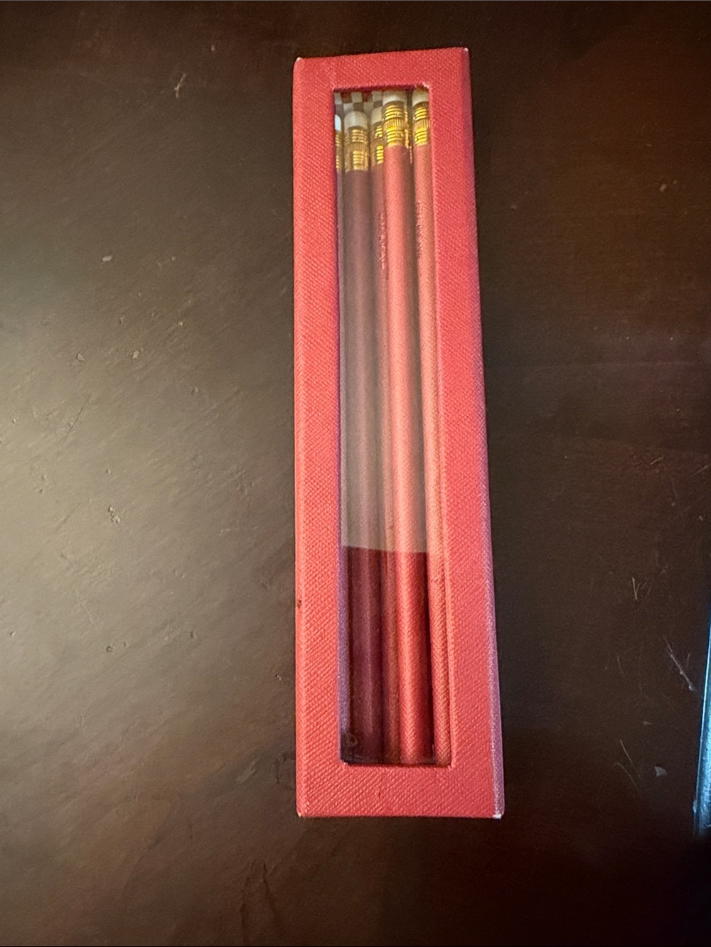 Michael Kors Red Pencil Set with Gold Ferrules. 7 pencils in box.